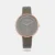 Elevate your look with this women's analog watch from the Purple Glam It Up collection by Titan. Encased in a 36.5 mm case, the rose gold round dial features plain 3-hand functionality and quartz movement on the watch. The genuine leather strap comes in a beige hue that further elevates the look of the watch. Besides, it is water resistant up to 50 m and is completed with a buckle to ensure a secure fit on the wrist
