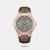 Elevate your style with Kenneth Cole New York's automatic watch featuring a partial see-through Grey dial. The striking line hour markers and contrast details create an ensemble that resonates with subtlety and distinction, making every passing moment an artistic expression of elegance. The genuine Brown leather strap complement the dial.