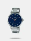 Defined by sharp lines and sweeping curves, the Waterbury Sub-second features an enhanced 39mm stainless-steel case with a slimmer profile and an elegant two-tiered bezel. Encircling the black dial are Roman numeral markers and a rail track, paired with a 24-hour format sub-dial just above 6 o’clock. This sophisticated timepiece is paired with a stainless-steel bracelet.
