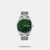 Complement your personality with this men's analog watch by Timex. Enclosed in a 43 mm case, the green round dial is secured by a mineral glass. It displays plain three hands. The stainless steel strap showcases a silver hue that uplifts the look of the watch. Besides, it is finished with a push-button clasp that provides a secure fit on the wrist.
