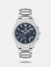 A distinctive design meets functionality in this watch, featuring a durable steel case with a matte finish. The dial is enhanced with Sunray technology, creating a subtle texture that interacts beautifully with light. Applied markers in a sleek stroke design, along with baton-style hands, ensure clear readability. A second time zone is displayed on a separate dial, while a date window is positioned between 4 and 5 o'clock. Luminescent-coated hands and markers allow visibility in low light. A secure steel bracelet with a folding clasp offers a comfortable fit.