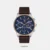 Taken from Santa Barbara Polo & Racquet Club, this men's analog watch is an exquisite timepiece that merges practicality with contemporary style. Its genuine leather strap flaunts a brown hue that accentuates the look of the watch. Safeguarded by a mineral glass and operated by a quartz movement, the round blue dial is encompassed in a 44 mm case. It features plain three hands and a crown for time adjustment. Besides, it is completed with a buckle clasp to ensure a secure fit on the wrist.