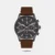 Taken from Santa Barbara Polo & Racquet Club, this men's analog watch is an exquisite timepiece that merges practicality with contemporary style. Its genuine leather strap flaunts a brown hue that accentuates the look of the watch. Safeguarded by a mineral glass and operated by a quartz movement, the round Grey dial is encompassed in a 44 mm case. It features plain three hands and a crown for time adjustment. Besides, it is completed with a buckle clasp to ensure a secure fit on the wrist.