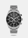 Add a classy touch to your attire by wearing this men's analog watch from the collection by Santa Barbara Polo & Racquet Club. The black round dial is protected by a mineral glass. It features crown for time adjustment. The stainless steel strap flaunts a black hue that accentuates the look of the watch. Besides, it is completed with a fold-over clasp to ensure a secure fit on the wrist.