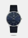Add a classy touch to your attire by wearing this men's analog watch from the collection by Santa Barbara Polo & Racquet Club. The black round dial is protected by a mineral glass. It features crown for time adjustment. The stainless steel strap flaunts a black hue that accentuates the look of the watch. Besides, it is completed with a fold-over clasp to ensure a secure fit on the wrist.
