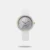 Make a statement with this elegant mother-of-pearl analog watch. Its circular dial showcases simple triple hands, a date window, and stick indices, exuding a timeless charm with a touch of mystery. Water-resistant up to 30m, it's designed for durability and functionality. Complete with a leather band and adjustable buckle clasp, this watch combines sophistication with practicality, perfect for everyday elegance.