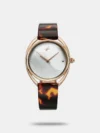 Effortlessly combining style and functionality, this women's analog watch from the Younique 2.0 collection by Fastrack will be a perfect pick. The metal strap showcases a pink hue that uplifts the look of the watch. Safeguarded by a mineral glass and functional on a quartz movement, the silver round dial is encompassed in a 36 mm case. It features plain three hands. Furthermore, it is complemented with a jewellery clasp that ensures a secure fit on the wrist.