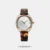 Style arrives effortlessly the moment you wear this smartly designed women's analog watch from the Younique 2.0 collection by Fastrack. Protected by a mineral glass, the silver round dial is nestled in a 36 mm case. It vaunts plain three hands. The metal strap comes in a brown hue that further elevates the look of the watch. Moreover, it is fitted with a jewellery clasp that ensures a secure fit on the wrist.