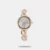 Effortlessly combining style and functionality, this women's analog watch from the Younique 2.0 collection by Fastrack will be a perfect pick. The metal strap showcases a pink hue that uplifts the look of the watch. Safeguarded by a mineral glass and functional on a quartz movement, the silver round dial is encompassed in a 36 mm case. It features plain three hands. Furthermore, it is complemented with a jewellery clasp that ensures a secure fit on the wrist.