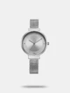 This sleek analog watch features a stainless steel mesh strap with a convenient sliding buckle for a secure fit. The round dial showcases minimalist dot hour markers for a stylish yet simple design. With a 30m water resistance, it’s built to handle daily wear easily.