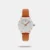 Take the offbeat lane wearing this quirky timepiece. The white round dial looks elegant with accents of orange on it. The orange leather belt strikes the right balance between sporty and feminine. Pair this watch with some white pants and an off-shoulder top for a dazzling look.