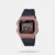 Enhance your casual style with this square 46mm case watch in a beautiful rose gold shade. The digital display is powered by quartz movement, ensuring accurate timekeeping. The black resin strap, 20mm wide, adds a modern touch to your look. With 5 ATM water resistance, it's suitable for both men and women. The tang buckle, resin glass, and 2-year warranty ensure reliability. Originating from Japan, this unisex watch weighs 32 grams and features a 12mm case thickness.