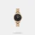 Infuse class to your casual attire with this women's analog watch from Lee Cooper. Secured by a mineral glass, the black round dial is nestled in a 34 mm case. It exhibits plain three hands. The stainless steel strap exudes a rose gold hue that accentuates the look of the watch. Moreover, it is equipped with a push-button clasp to ensure a secure fit on the wrist.