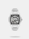 A classy look in a contemporary frame is what perfectly defines this women's analog watch from the collection by Lee Cooper. Its stainless steel strap exudes a two tone hue that elevates the look of the watch. Housed in a 34 mm case, the silver round dial is protected by a mineral glass. It showcases plain three hands. Furthermore, it is complemented with a push-button clasp that ensures a secure fit on the wrist.