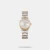 A classy look in a contemporary frame is what perfectly defines this women's analog watch from the collection by Lee Cooper. Its stainless steel strap exudes a two tone hue that elevates the look of the watch. Housed in a 34 mm case, the silver round dial is protected by a mineral glass. It showcases plain three hands. Furthermore, it is complemented with a push-button clasp that ensures a secure fit on the wrist.