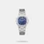 Enhance your style quotient by wearing this women's analog watch from the collection by Lee Cooper. Its stainless steel strap exudes a silver hue that accentuates the look of the watch. Safeguarded by a mineral glass and operated by a quartz movement, the blue square dial is encompassed in a 38 mm case. It showcases plain three hands. Furthermore, it is complemented with a push-button clasp that ensures a secure fit on the wrist.
