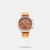 Look modish by donning this men's analog watch from the Tick Tock collection by Fastrack. Enclosed in a 43 mm case, the orange round dial looks quite attractive. It displays plain three hands and a crown for time adjustment. The genuine leather strap showcases an orange hue that uplifts the look of the timepiece. Besides, it is completed with a buckle clasp to ensure a secure fit on the wrist.