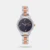 This women's analog watch from Helix is a must-have timepiece that merges functionality with modern style. Functional on a quartz movement, the navy round dial features plain three hands, hour markings at the 6th, 9th and 12th-hour positions, brand naming at the 3rd-hour position and a crown for time adjustment. The stainless steel strap showcases combined shades of silver and rose gold that uplift the look of the watch.