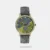 Elevate your accessory collection with this men's casual analog watch from the Dial it up collection by Fastrack. It has a green round stick dial. This multifunction watch features a crown for time adjustment. The genuine leather strap comes in a grey hue that further elevates the look of the watch. Besides, it is completed with a buckle clasp to ensure a secure fit on the wrist. It is water-resistant up to 50 m. It has stick needle, Quartz movement and a dial diameter of 43 mm. It shows the day and date accurately.