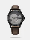 Make a bold impression with this sophisticated watch. The round dial features a classic 3-hand movement, with stick indices, along with a convenient date window. Designed for both style and durability, the watch offers water resistance up to 50 meters and is equipped with a robust leather strap, secured with a tang buckle closure for a comfortable fit.