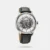 Give your wrist a classy look with this men's analog watch from the Automatic collection by Titan. Encased in a 51 mm case, the silver round dial is protected by a sapphire glass. It features plain three hands. The genuine leather strap showcases a black hue that uplifts the look of the watch. Besides, it is completed with a buckle clasp to ensure a secure fit on the wrist.