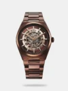 The Titan Nexus Skeletal Automatic blends contemporary aesthetics with timeless symbolism. Its unique skeletal dial, inspired by a ships helm, represents movement and progress, offering a glimpse into the intricate automatic movement with 21 jewels and a 42-hour reserve. Available in striking brown, gunmetal, and blue monochromatic finishes, its integrated bracelet ensures a seamless, modern look that is both stylish and comfortable. Luminous hands, applied indices, and a minute ring enhance functionality, making this timepiece a refined choice for any occasion.
