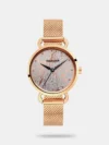 Sophistication meets simplicity in this analog watch from the Glitch collection by Fastrack. This women's analog watch is housed in a 33.5 mm case. The gold round-shaped dial features plain 3-hand functionality for time adjustment. The watch runs on a quartz movement. The brass bracelet comes in a gold hue that additionally boosts the look of the watch. Moreover, it is water resistant up to 30 m and is completed with a jewellery clasp to ensure a secure fit on the wrist.