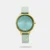 Lending a contemporary twist to an elegant design, this women's analog watch from the Glitch collection by Fastrack is a must-have wrist essential. Its genuine leather strap comes in a shade of green that elevates the look of the watch. The green round dial is secured by a mineral glass and is housed in a 33.7 mm case. It exudes plain three hands and a crown for time adjustment. Furthermore, it is completed with a buckle clasp to ensure a secure fit on the wrist.