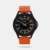 Add smartness to your personality by wearing this men's analog watch from Helix. Operated by a quartz movement and safeguarded by a mineral glass, the black round dial is encased in a 22 mm case. It features plain three hands, a crown for time adjustment, stick and numeral indices for time reading ease. The rubber strap comes in an orange hue that further elevates the look of the timepiece. Moreover, it is fitted with a buckle clasp to ensure a secure fit on the wrist.