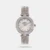 Infuse class to your casual attire with this women's analog watch from Helix. Secured by a mineral glass, the round dial is nestled in a 22 mm case. It exhibits plain three hands, dotted hour markings at five-minute intervals, a textured outer rim and a crown for time adjustment. The stainless steel strap exudes an elegant silver hue that accentuates the look of the watch. Moreover, it is equipped with a hook buckle clasp to ensure a secure fit on the wrist.