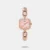 Enhance your style quotient by wearing this women's analog watch from the Fria collection by Timex. Its brass strap exudes a rose gold hue that accentuates the look of the watch. Safeguarded by a mineral glass and operated by a quartz movement, the pink square dial is encompassed in a 27 mm case. It showcases plain three hands. Furthermore, it is complemented with a jewellery clasp that ensures a secure fit on the wrist.