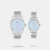 The Timex TW00PR360 is an elegant, matching analog couple's watch set featuring a vibrant sky-blue dial and a classic silver-tone stainless steel bracelet. Powered by reliable quartz movement, this brass-case duo blends a modern aesthetic with everyday 3 ATM water resistance.