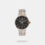 Discover Timex watch for men, featuring a black dial, a dual tone strap made of stainless steel in a round case. Built with mineral and brass body to balance clarity and durability. Dimensions include 41 mm dial size, 11 - 20 mm strap width, 10 - 14 mm profile for comfortable wear. Key features: quartz movement, analog display, 3 atm water resistance. A secure foldover clasp ensures a dependable fit.