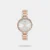 Discover Timex watch for women, featuring a silver dial, a dual tone strap made of stainless steel in a round case. Built with mineral and brass body to balance clarity and durability. Dimensions include 35 mm dial size, 11 - 20 mm strap width, 6 - 9 mm profile for comfortable wear. Key features: quartz movement, analog display, 3 atm water resistance. A secure foldover clasp ensures a dependable fit.