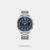 The Tornado T25104S-SBSN-N is a premium men's chronograph watch featuring a distinct 42mm square blue dial and a durable silver 316L stainless steel link bracelet. Powered by a precise Seiko VK64 Meca-Quartz movement, this stylish timepiece includes a butterfly clasp closure and comes as a curated gift set featuring a matching luxury wallet.