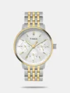 Discover Timex watch for unisex, featuring a pink dial, a silver strap made of stainless steel in a square case. Built with mineral and stainless steel body to balance clarity and durability. Dimensions include 34 mm dial size, 10 - 14 mm profile for comfortable wear. Key features: automatic movement, analog display, 5 atm water resistance. A secure expansion band ensures a dependable fit.