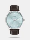 Discover Timex watch for women, featuring a pink dial, a dual tone strap made of stainless steel in a cushion case. Built with mineral and brass body to balance clarity and durability. Dimensions include 29.4 mm dial size, 11 - 20 mm strap width, 6 - 9 mm profile for comfortable wear. Key features: quartz movement, analog display, 3 atm water resistance. A secure foldover clasp ensures a dependable fit.