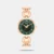 The Timex Trendline TWTL16400T is an elegant analog women's watch featuring a 30mm emerald green dial housed in a durable rose gold-finished brass case. It is paired with a sleek, jewelry-style brass bracelet, powered by a reliable quartz movement, and offers 30-meter water resistance, making it a perfect accessory for formal wear, festive occasions, and office styling.