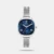 The Timex Trendline TWTL16500T is a sleek, minimalist analog watch for women. It features a distinct square brass case, a vibrant blue dial, and an elegant silver stainless steel mesh strap. Driven by a reliable quartz movement and offering 30-meter water resistance, it is a versatile accessory designed for both casual and formal wear.