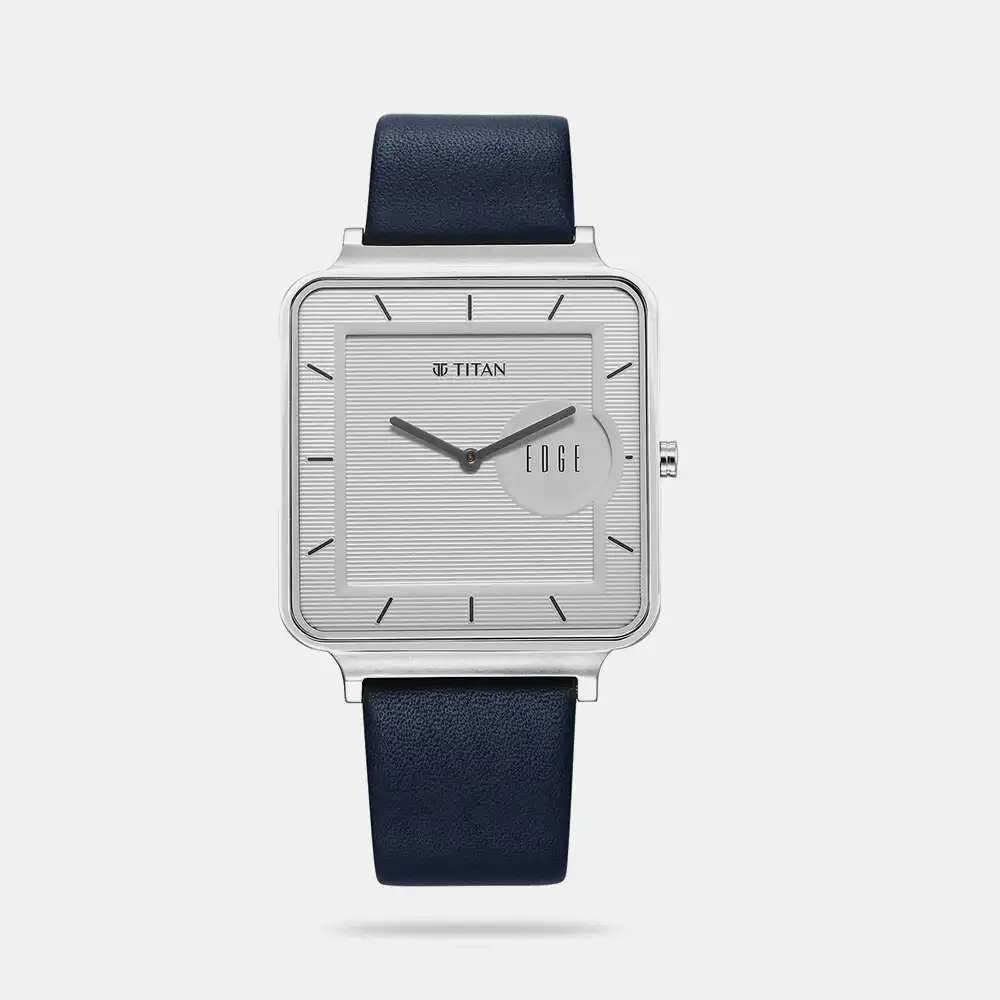 https://watchpalace.in/product/titan-edge-quad-quartz-analog-white-dial-with-blue-leather-strap-watch-for-men-nt10017sl01/ Titan Edge Quad Quartz Analog White Dial With Blue Leather Strap Watch For Men - NT10017SL01