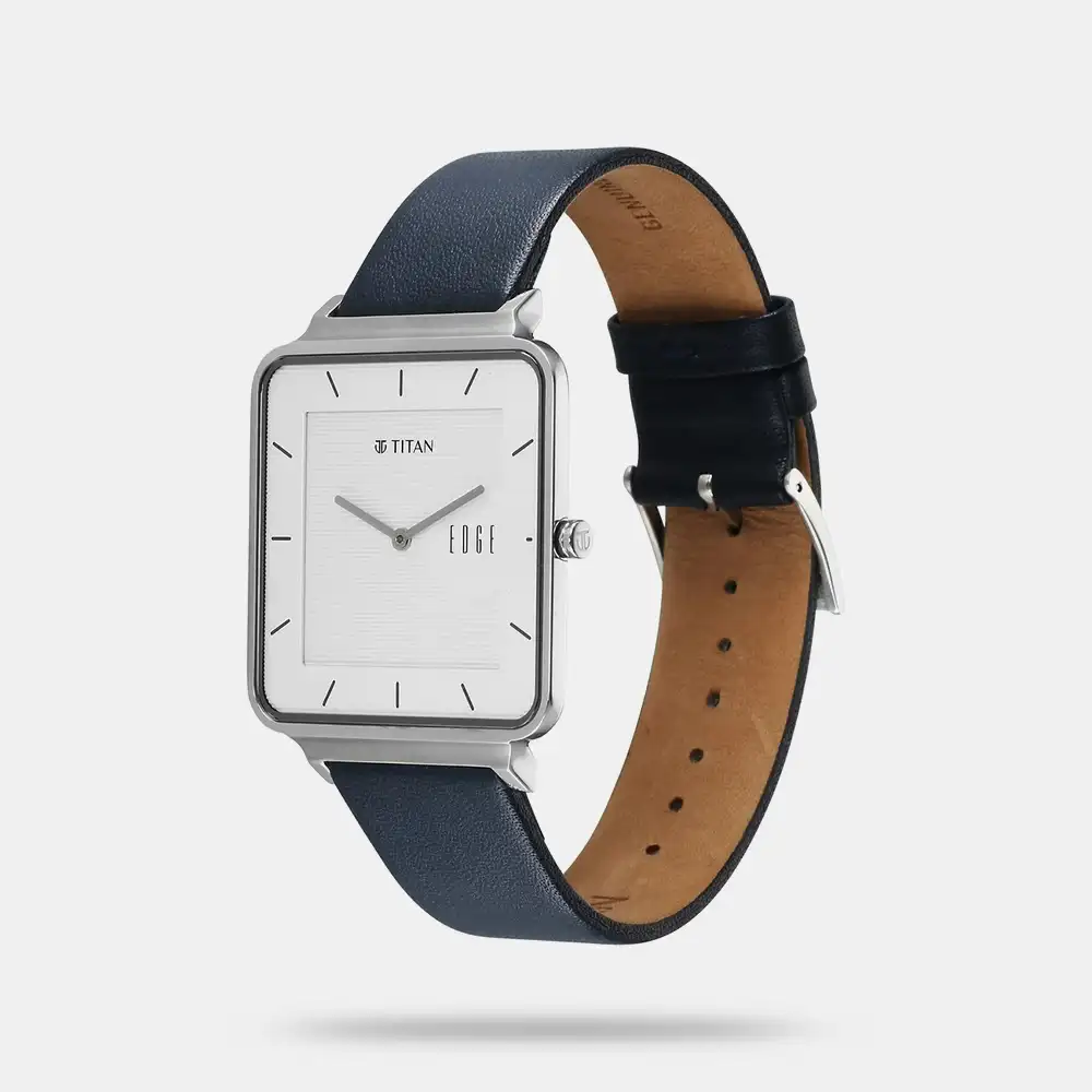 https://watchpalace.in/product/titan-edge-quad-quartz-analog-white-dial-with-blue-leather-strap-watch-for-men-nt10017sl01/ Titan Edge Quad Quartz Analog White Dial With Blue Leather Strap Watch For Men - NT10017SL01 - Image 2